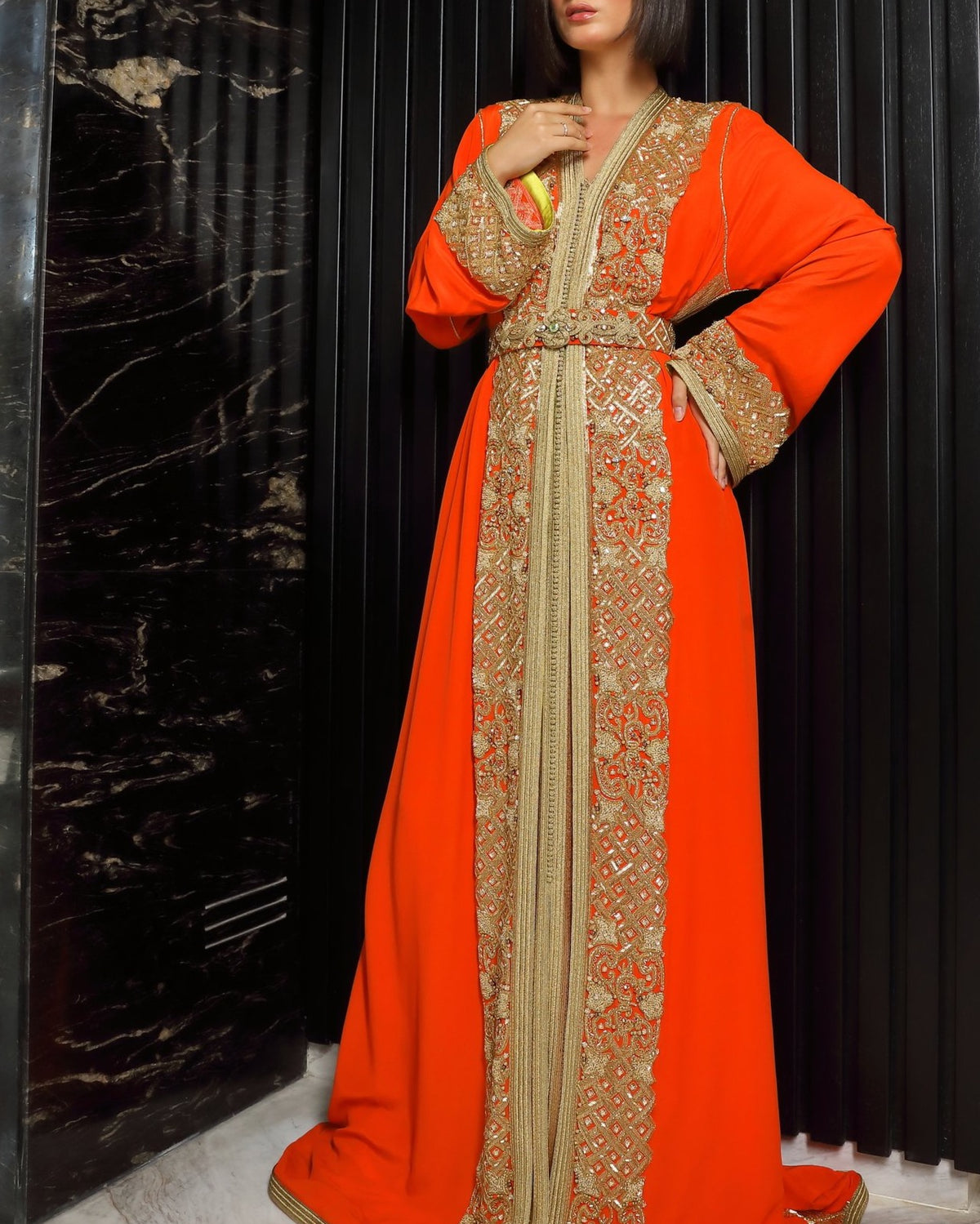 Coral Solstice couture kaftan in refined orange crepe drape