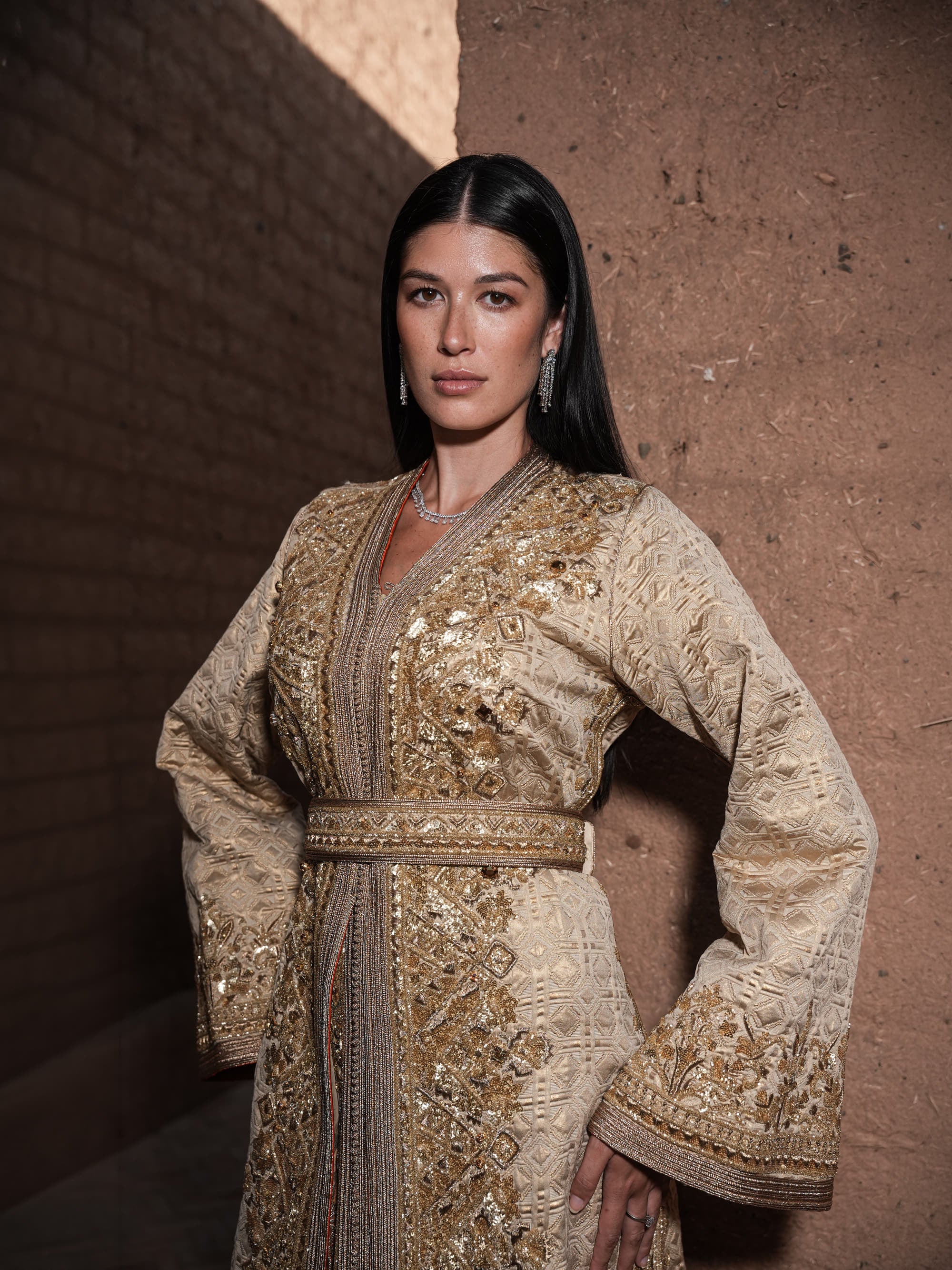Alabaster Aria quilted ivory brocade Moroccan kaftan with gold sequin embroidery and belted waist, full-length view