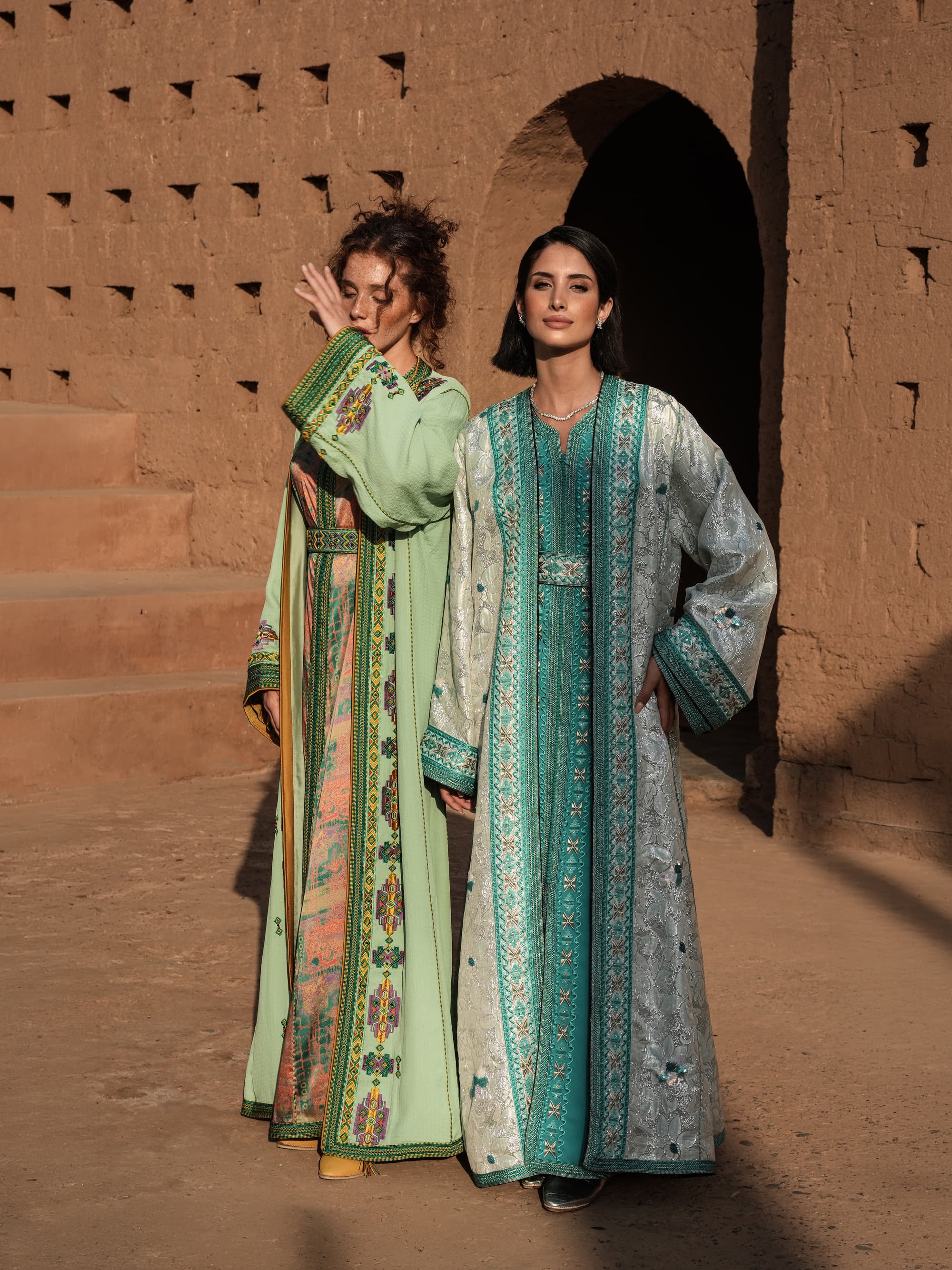 Azure Constellation turquoise Moroccan kaftan with star embroidery under an ivory brocade mansouria, shown alongside a second look